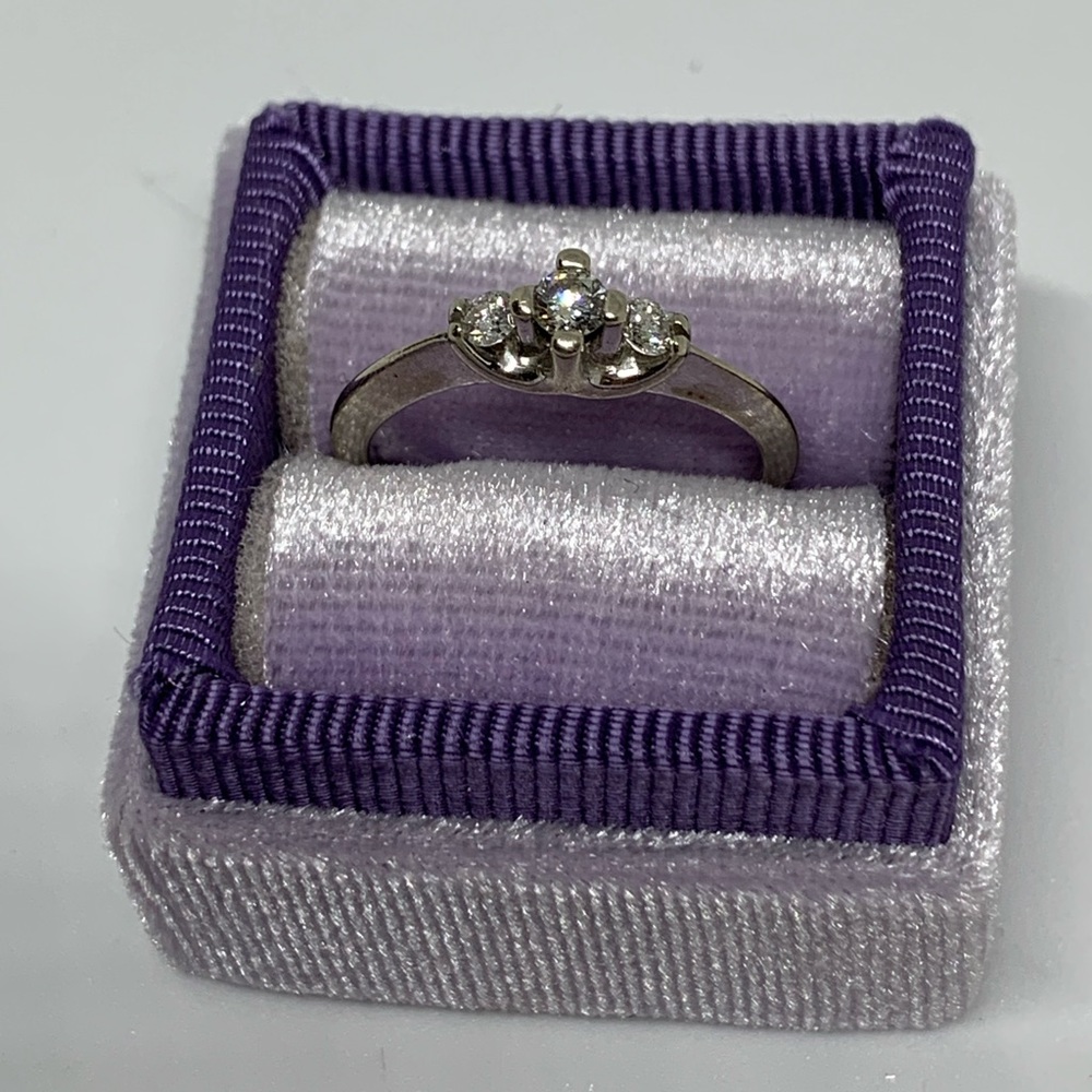 14k white gold diamond ring.